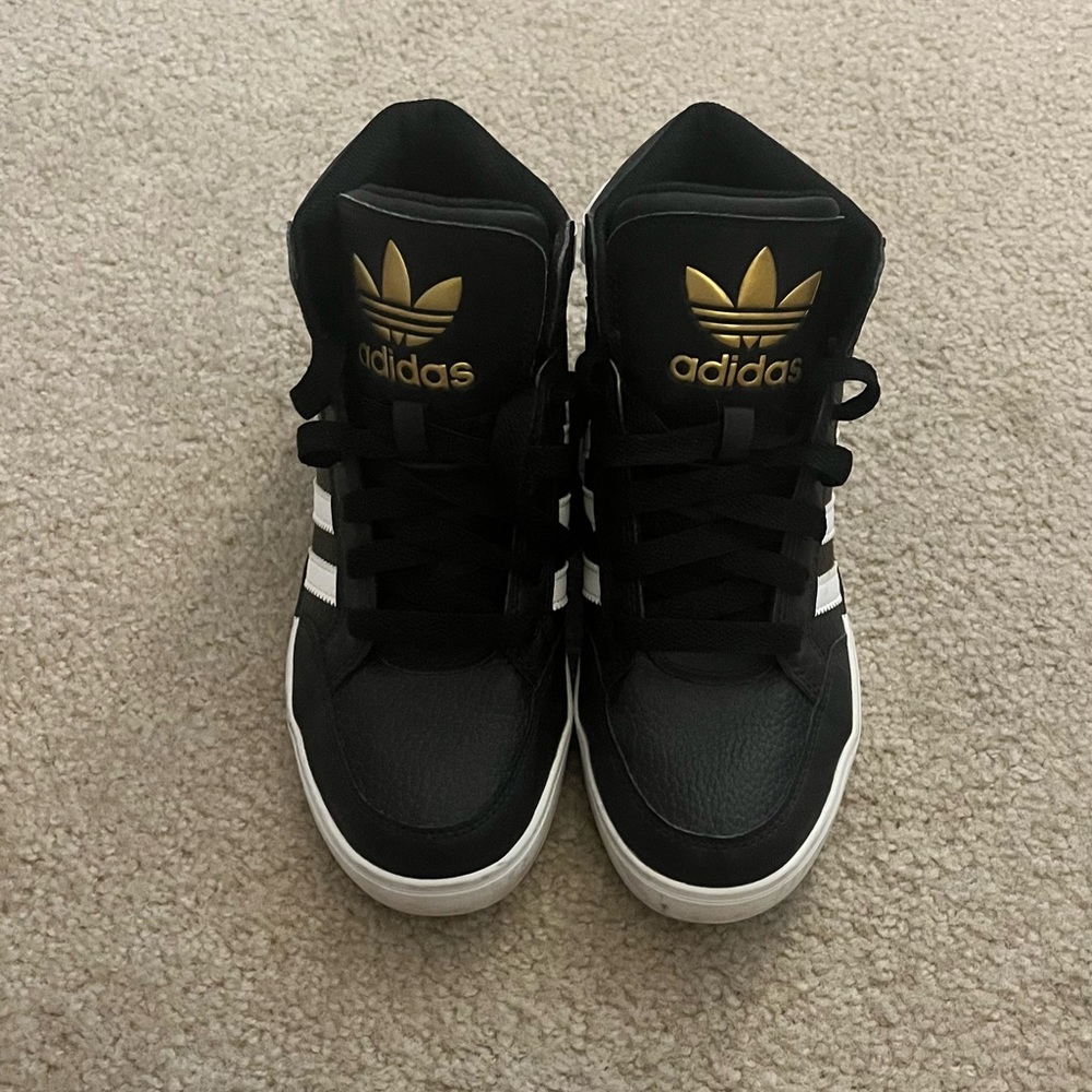 Adidas high top sneakers.